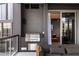 Outdoor kitchen and lounge area on balcony at 3107 Peachtree Road Ne Unit #1803, Atlanta, GA 30305