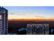 Breathtaking aerial view of the city skyline at sunset at 3107 Peachtree Road Ne Unit #1803, Atlanta, GA 30305