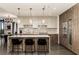 Modern kitchen with large island and stainless steel appliances at 3107 Peachtree Road Ne Unit #1803, Atlanta, GA 30305