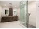 Spa-like bathroom with double sinks, large shower, and modern fixtures at 3107 Peachtree Road Ne Unit #1803, Atlanta, GA 30305