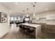 Gourmet kitchen boasts expansive granite island, modern cabinetry, and high-end appliances at 3107 Peachtree Road Ne Unit #1803, Atlanta, GA 30305