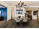 Modern dining room with hardwood floors and an open floor plan at 3107 Peachtree Road Ne Unit #1803, Atlanta, GA 30305