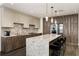 Modern kitchen with sleek cabinetry, granite countertops, and high-end appliances at 3107 Peachtree Road Ne Unit #1803, Atlanta, GA 30305