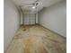 Attached garage with painted walls and concrete floor at 340 Lakeview Trl, Covington, GA 30016