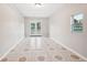 Bonus room with tile flooring and french doors to the exterior at 79 Russell Ln, Dallas, GA 30157