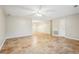 Open and airy living area with tiled floors and ceiling fan at 79 Russell Ln, Dallas, GA 30157