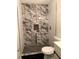 Modern shower with marble-look tile at 5364 Cedar Rock Dr, Stonecrest, GA 30038