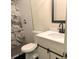 Modern bathroom with white vanity and marble shower at 5364 Cedar Rock Dr, Stonecrest, GA 30038