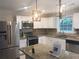 Modern kitchen featuring granite countertops and stainless steel appliances at 5364 Cedar Rock Dr, Stonecrest, GA 30038