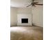 Living room with white brick fireplace at 5364 Cedar Rock Dr, Stonecrest, GA 30038