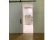 Laundry room with white cabinets and barn door entry at 5364 Cedar Rock Dr, Stonecrest, GA 30038
