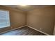 Simple bedroom with window and neutral wall paint at 41 Ludwick Ln, Lawrenceville, GA 30046