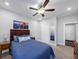 Spacious bedroom with a ceiling fan and ample natural light at 446 Payne Rd, Woodstock, GA 30188