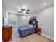 Spacious bedroom with plush carpet and large window at 446 Payne Rd, Woodstock, GA 30188