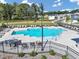 Community pool with plenty of lounge chairs at 446 Payne Rd, Woodstock, GA 30188