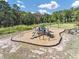 Community playground with playset and swings at 446 Payne Rd, Woodstock, GA 30188