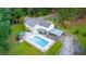 Stunning aerial view of the house, pool, and expansive property at 2298 Cole Lake Rd, Dallas, GA 30157
