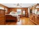 Charming bedroom with wood walls, hardwood floors, and antique furniture at 2298 Cole Lake Rd, Dallas, GA 30157