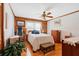 Bright bedroom with wood walls and hardwood floors at 2298 Cole Lake Rd, Dallas, GA 30157