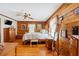 Spacious bedroom featuring wood walls and a ceiling fan at 2298 Cole Lake Rd, Dallas, GA 30157