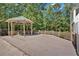 Charming gazebo and expansive deck create a serene outdoor space at 2298 Cole Lake Rd, Dallas, GA 30157