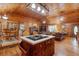 Kitchen island with cooktop and wood cabinets at 2298 Cole Lake Rd, Dallas, GA 30157