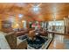 Spacious living room with leather sofas and wood flooring at 2298 Cole Lake Rd, Dallas, GA 30157