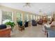 Sunroom with ample natural light and comfortable seating at 2298 Cole Lake Rd, Dallas, GA 30157