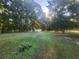 Large backyard with fenced pool area at 1720 Mount Carmel Rd, Mcdonough, GA 30253