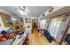 Bright dining area with wood floors and built-in hutch at 1720 Mount Carmel Rd, Mcdonough, GA 30253