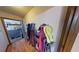 Inviting hallway with coat hooks and wood floors at 1720 Mount Carmel Rd, Mcdonough, GA 30253