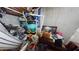 Unfinished basement with storage and clutter at 1720 Mount Carmel Rd, Mcdonough, GA 30253