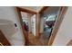 View down a hallway with access to two bedrooms at 1720 Mount Carmel Rd, Mcdonough, GA 30253