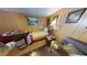 Small basement bedroom with bed and dresser at 1720 Mount Carmel Rd, Mcdonough, GA 30253