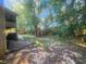 Wooded backyard with a pathway at 1720 Mount Carmel Rd, Mcdonough, GA 30253