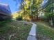 Curving pathway through wooded area at 1720 Mount Carmel Rd, Mcdonough, GA 30253