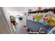 Garage entry with storage shelving and space for two cars at 1720 Mount Carmel Rd, Mcdonough, GA 30253