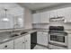 Kitchen with granite countertops and stainless steel appliances at 970 Sidney Marcus Ne Blvd # 1204, Atlanta, GA 30324