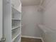 Large walk-in closet with built-in shelving and drawers at 970 Sidney Marcus Ne Blvd # 1204, Atlanta, GA 30324