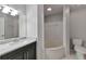Updated bathroom features a marble vanity, soaking tub, and modern fixtures at 970 Sidney Marcus Ne Blvd # 1204, Atlanta, GA 30324