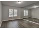 Versatile bonus room with mirrored wall and wood-look floors at 970 Sidney Marcus Ne Blvd # 1204, Atlanta, GA 30324