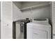 Laundry room with washer, dryer, and shelving at 970 Sidney Marcus Ne Blvd # 1204, Atlanta, GA 30324