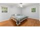 Main bedroom with hardwood floors and plenty of natural light at 2263 Winding Way, Tucker, GA 30084