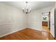 Formal dining room with hardwood floors and kitchen access at 2263 Winding Way, Tucker, GA 30084