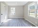 Well-lit bedroom featuring new flooring and neutral walls at 42 Guinn St, Marietta, GA 30060