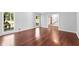 Hardwood floor living room with views to entry and stairs at 5530 Aven Rd, Marietta, GA 30068