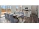 Bright dining area with large table and access to the backyard at 2489 Argento Cir, Dacula, GA 30019