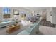 Open living room with light-colored sofa and access to the dining area at 2489 Argento Cir, Dacula, GA 30019