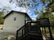 Back deck with stairs leading to the backyard at 8165 Thompson St, Douglasville, GA 30134