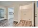 Laundry room with built-in shelving and access to kitchen at 443 Creekwood Pass, Dallas, GA 30157